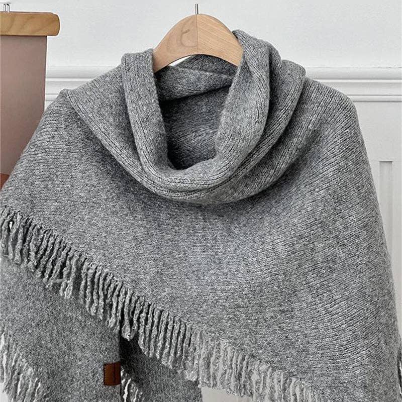 PONCHO À BORDS FRANGÉS BEIGE